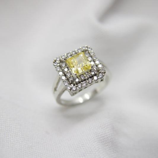 Yellow Stone and Cubic Zirconia Surround Sterling Silver Ring