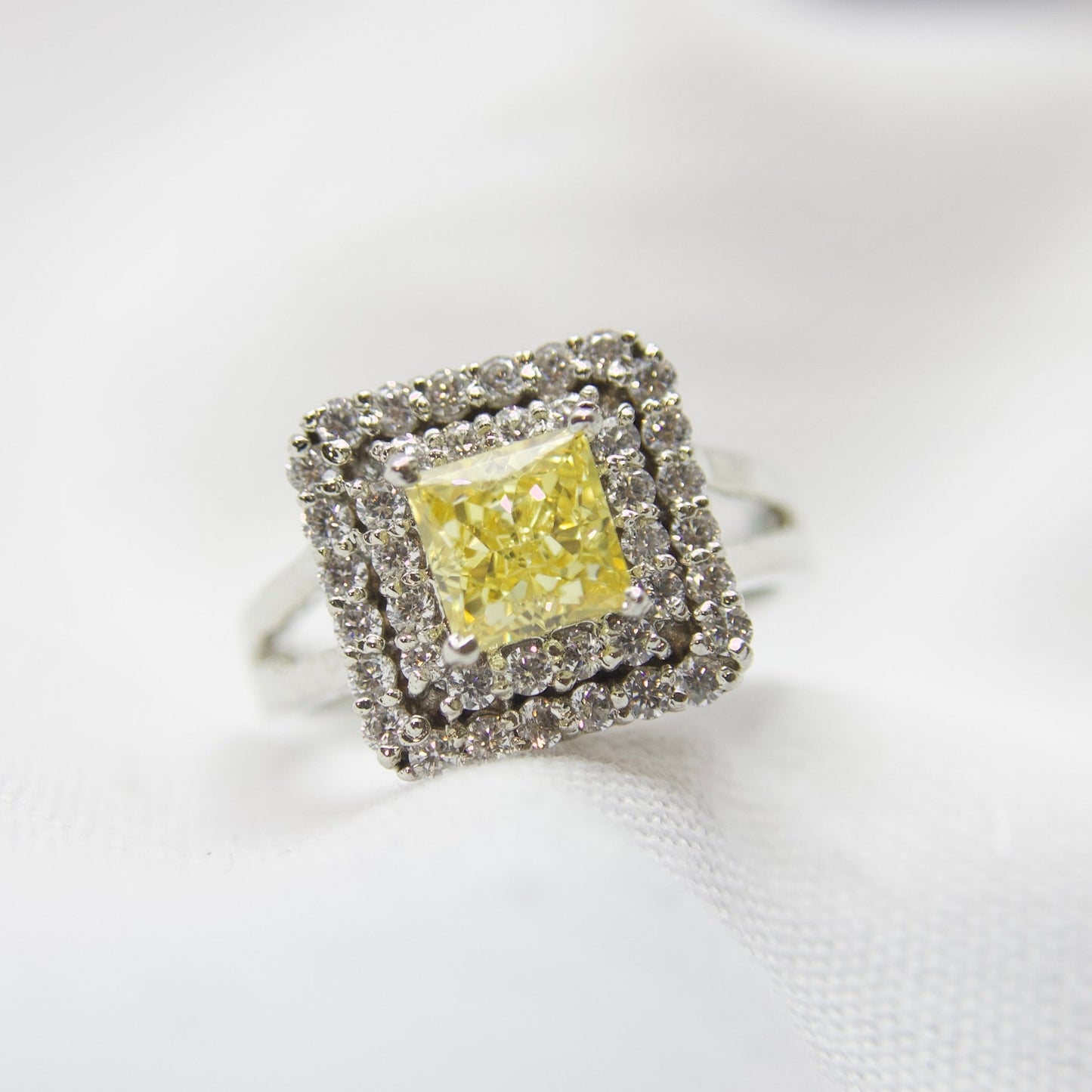 Yellow Stone and Cubic Zirconia Surround Sterling Silver Ring